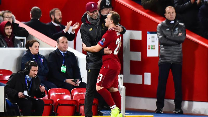 Jurgen Klopp bersama dengan Xherdan Shaqiri Copyright: INDOSPORT
