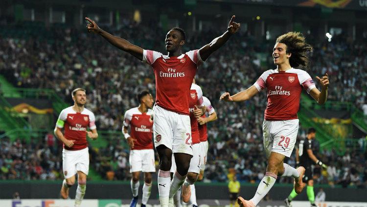 Penyerang Arsenal Welbeck usai mencetak gol ke gawang Sporting Lisbon. Copyright: twitter/europaleague