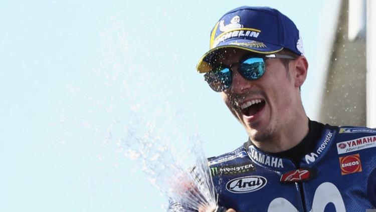 Maverick Vinales melakukan selebrasi.
