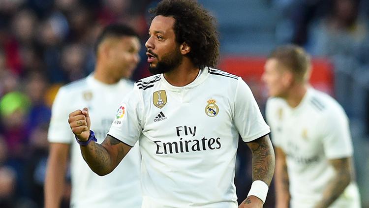 Marcelo berselebrasi usai mencetak gol ke gawang Barcelona di pekan ke-10 La Liga 2018/19. Copyright: Getty Images/Alex Caparros