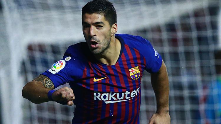 Luis Suarez berselebrasi usai mencetak gol ke gawang Rayo Valecano.