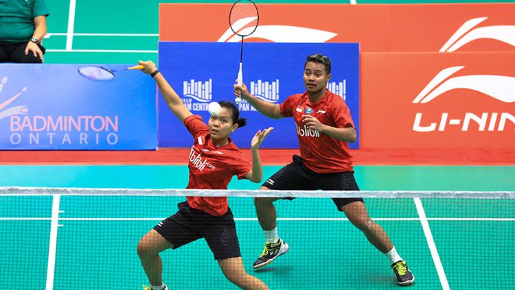 Pasangan ganda campuran nasional, Rehan Naufal Kusharjanto/Siti Fadia Silva Ramadhanti dalam aksinya di ajang BWF World Junior Championships 2018
