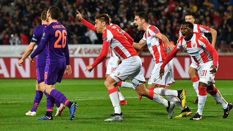 Milan Pavkov (tengah) berselebrasi usai mencetak gol ke gawang Liverpool. - INDOSPORT