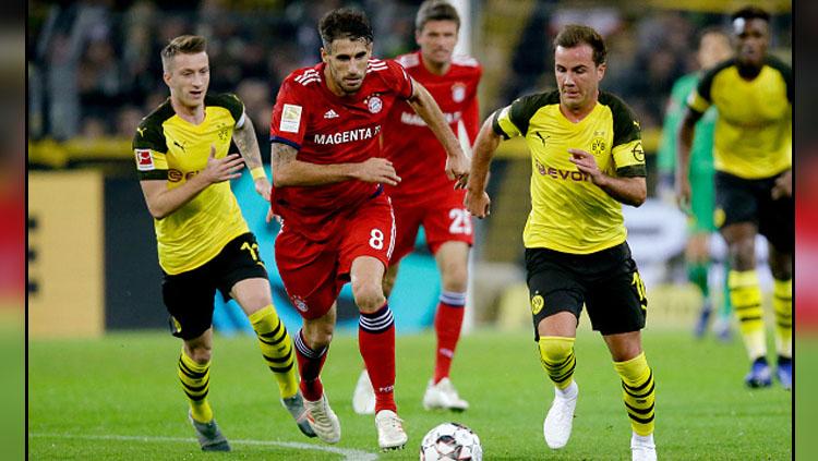 Suasana pertandingan Bayern Munchen vs Borussia Dortmund.