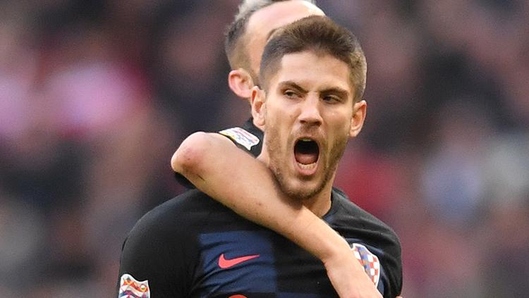 Andrej Kramaric berselebrasi usai mencetak gol ke gawang Inggris.