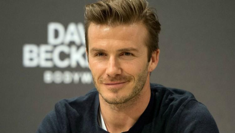 David Beckham dikenal sebagai pesepak bola berwajah paling tampan di dunia. Copyright: The Indian Express