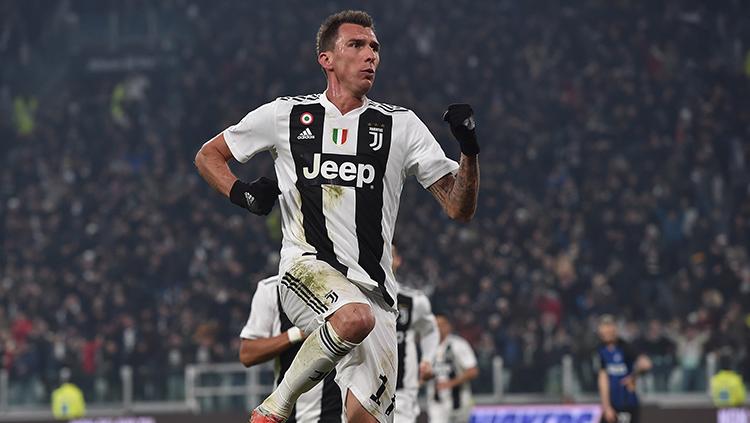 Selebrasi Mandzukic setelah membobol gawang Inter Milan.