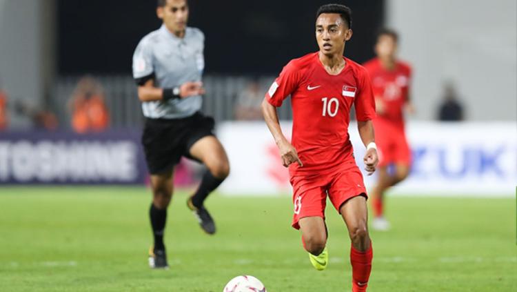 Faris Ramli pemain Timnas Singapura saat menggiring bola. Copyright: Getty Images