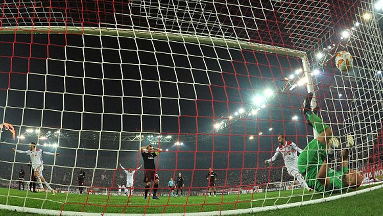 Suasana pertandingan Olympiakos vs AC Milan di Liga Europa.