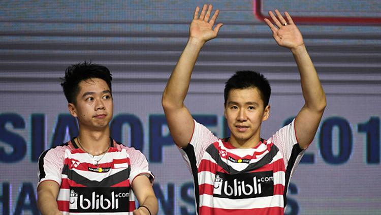 Marcus Fernaldi Gideon yang berpasangan dengan Kevin Sanjaya Sukamuljo rayakan kemenangan dengan membanting raket.