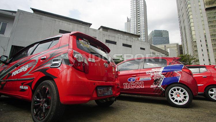 Mobil peserta Red Car Community of Indonesia (RCCI). - INDOSPORT