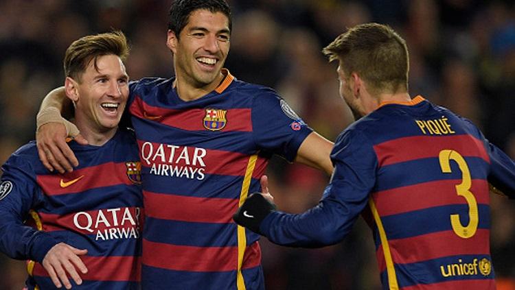 Lionel Messi, Luis Suarez dan Gerard Pique rayakan gol kemenangan Copyright: AFP