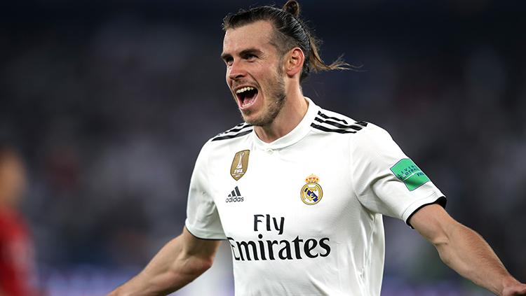 Gareth Bale berselebrasi usai mencetak gol ke gawang Kashima Antlers. Copyright: Twitter.com/FIFAcom