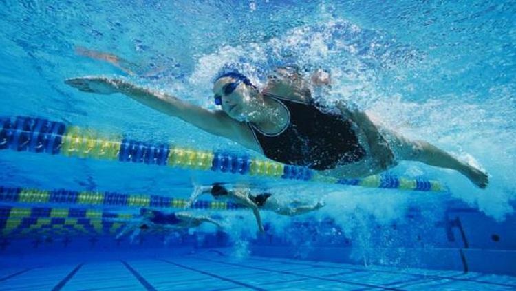 Para atlet renang harus berjibaku dengan suhu air kolam saat melakukan uji coba jelang Olimpiade Tokyo 2020. Ilustrasi: Shutterstock/bikeriderlondon. - INDOSPORT