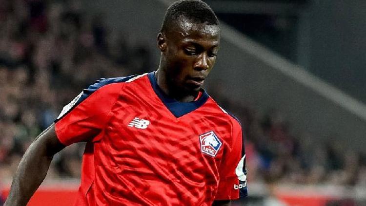 Indosport - Nicolas Pepe, pemain Lille yang kabarnya semakin dekat ke Arsenal atau Napoli.
