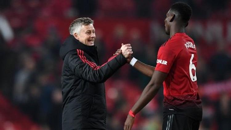 Solskjaer bersalaman dengan Pogba Copyright: RTE.ie