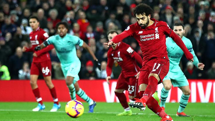 Mohamed Salah saat mencetal gol dari titik penalti. Copyright: Getty Images