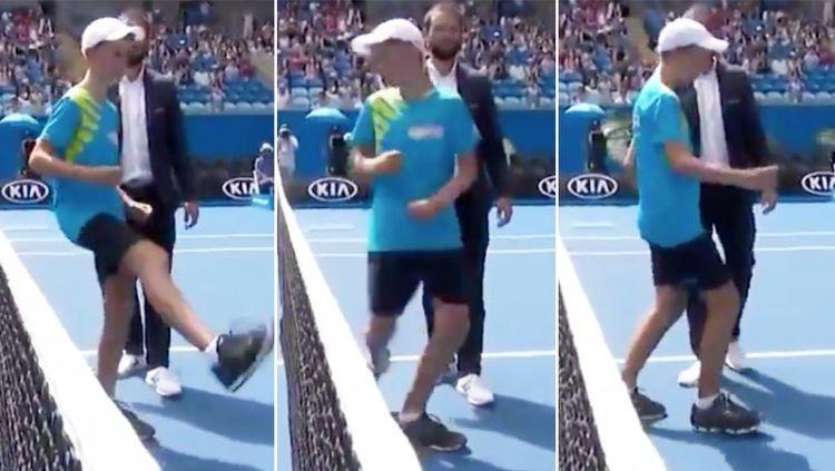 Aksi ball boy di laga Kei Nishikori vs Kamil Majchrzak.