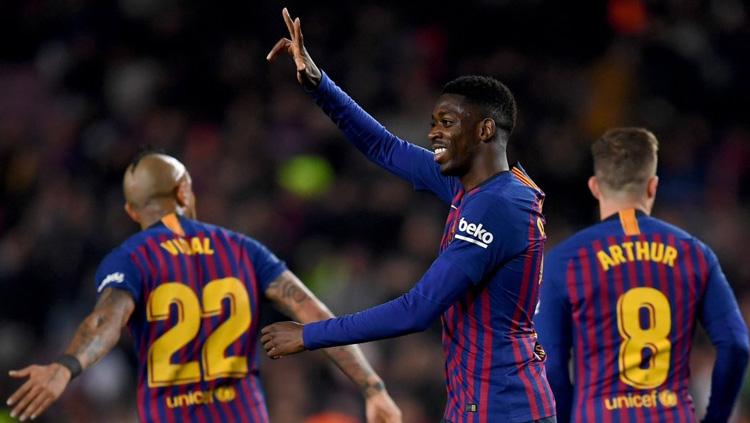 Gaya pemain Barcelona Ousmane Dembele saat membobol kiper Levante di laga Copa del Rey, Jumat (18/01/19). Copyright: Twitter/@tobiasram1r0