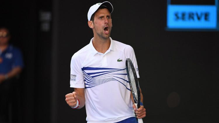 Novak Djokovic selebrasi usai memastikan tiket ke 16 besar Australia Terbuka, Sabtu (19/01/19). Copyright: Twitter/Australia Open