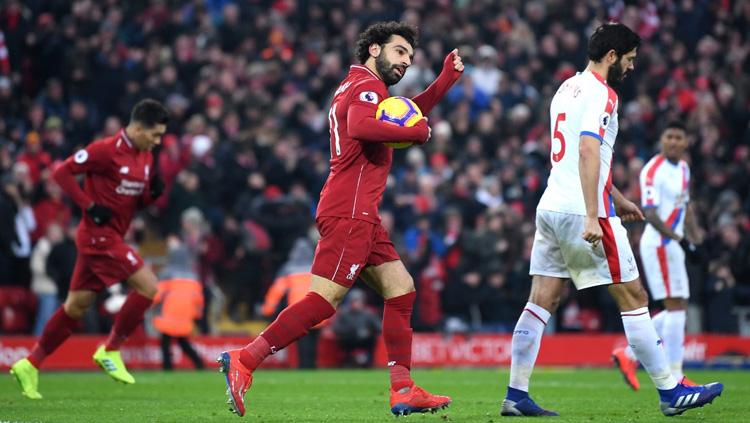 Pemain Liverpool Mohamed Salah merayakan gol ke gawang Crystal Palace pada laga Liga Primer Inggris (Premier League), Sabtu (19/01/19).