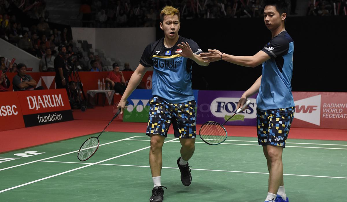 Pasangan ganda putra Indonesia, Marcus Fernaldi Gideon/Kevin Sanjaya Sukamuljo berhasil melaju ke final Indonesia Masters 2019 Copyright: Herry Ibrahim/INDOSPORT