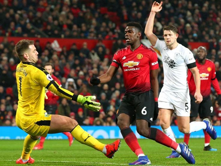 Paul Pogba pada laga melawan Cardiff City Copyright: Getty Images