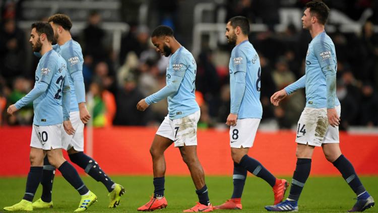 Para pemain Manchester City tertunduk lesu usai dikalahkan oleh Newcastle United, Rabu (30/01/19) dini hari tadi.