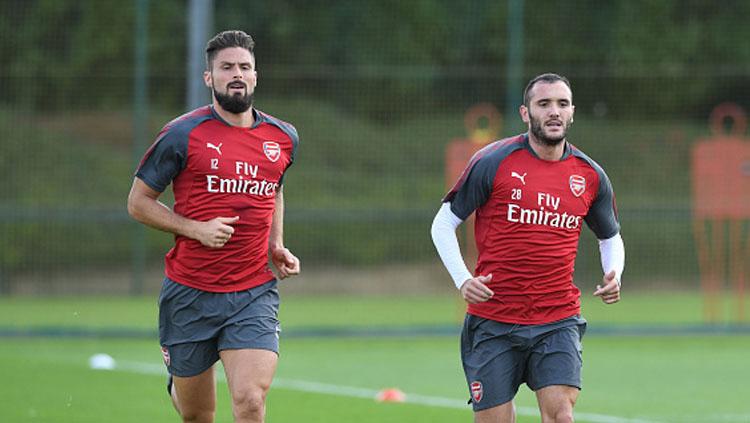Olivier Giroud (kiri) dan Lucas Perez, 2 mantan pemain Arsenal.