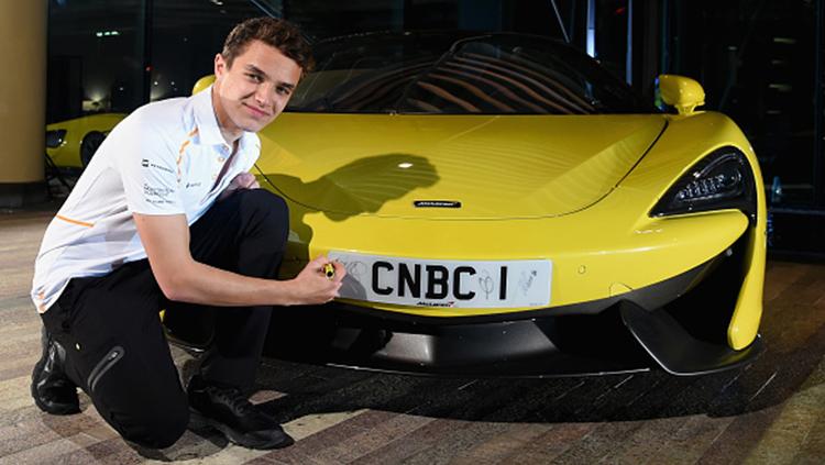 Lando Norris ternyata suka bermain game simulasi balapan. - INDOSPORT