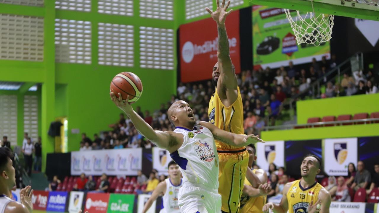 Pertandingan antara Satria Muda vs Satya Wacana.