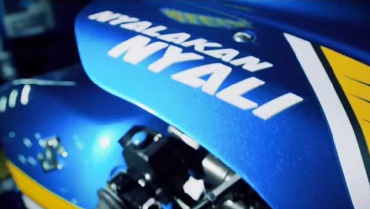 Slogan Nyalakan Nyali terpangpang di body motor Suzuki MotoGP Copyright: Istimewa