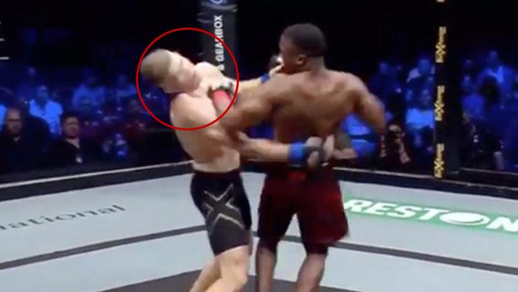 Mzwandile Hwawa berhasil menjatuhkan Torbjorn Madsen dengan memutar balik badan. - INDOSPORT