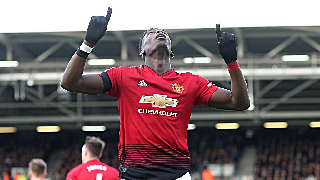 Selebrasi Paul Pogba (Manchester United) usai mencetak gol pertama ke gawang Fulham. - INDOSPORT