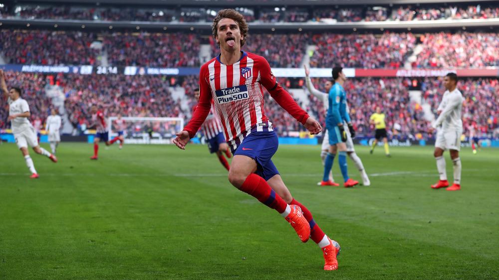 Selebrasi Antoine Griezmann usai cetak gol ke gawang Real Madrid Copyright: Getty Images