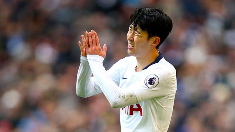 Penyerang Tottenham Hotspur, Son Heung-min, diketahui menjadi korban rasis fans Everton usai melakukan tekel keras kepada Andre Gomes. - INDOSPORT
