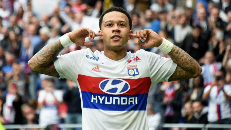 Pemain Lyon Memphis Depay. Copyright: Getty Images