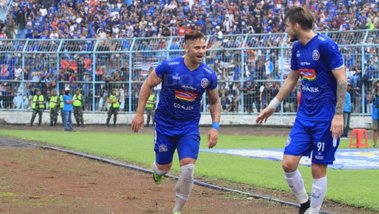 Aksi selebrasi pemain Arema FC kala menghadapi Persib Bandung.
