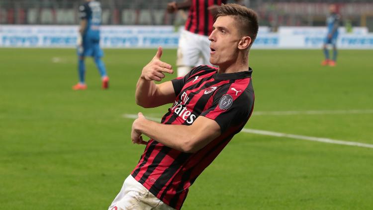 Striker AC Milan, Krzysztof Piatek, saat merayakan gol kontra Empoli.
