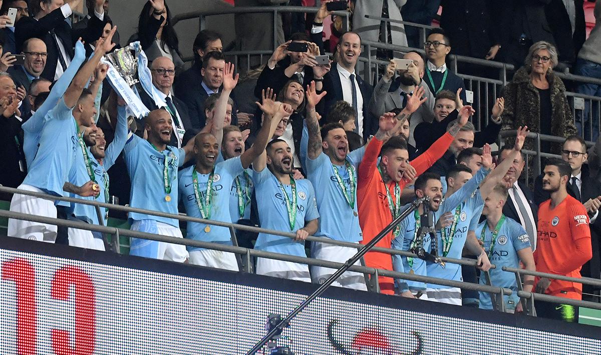Pemain Manchester City merayakan kemenangan sebagai juara Piala Liga Inggris Copyright: INDOSPORT
