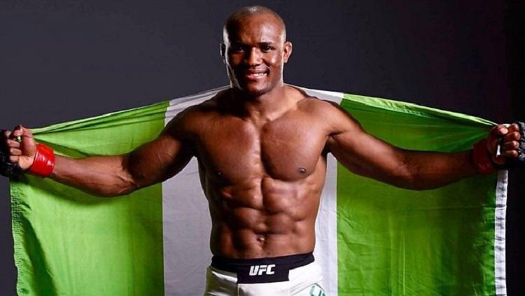 Kamaru Usman asal Nigeria berhasil mengalahkan Tyron Woodley di ajang UFC. - INDOSPORT