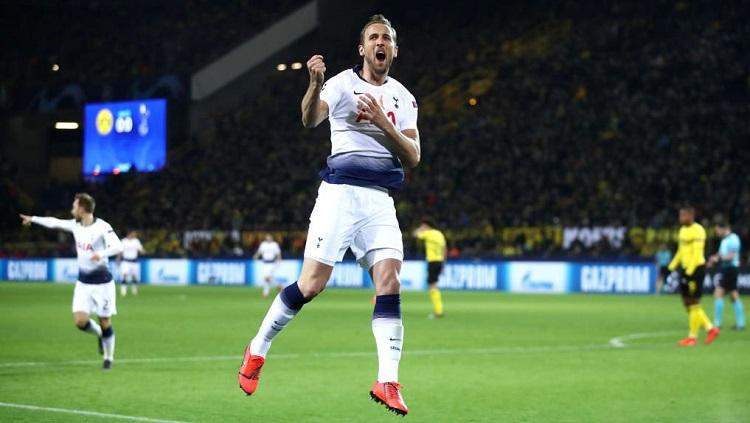 Harry Kane merayakan gol ke gawang Dortmund. Copyright: Twitter @SpursOfficial