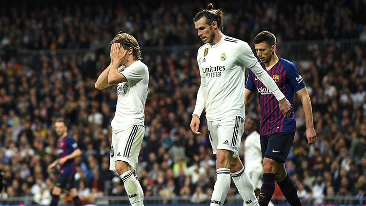 Luka Modric tutup wajah karena gagal mengamankan peluang yang hilang pertandingan La Liga di Estadio Santiago Bernabeu, Sabtu (02/03/19) Spanyol. Copyright: INDOSPORT