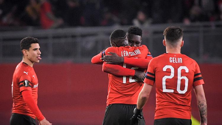 Selebrasi para pemain Rennes saat kalahkan Arsenal di leg pertama babak 16 besar Liga Europa 2018/19.