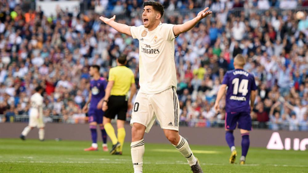 Real Madrid baru saja menjadi kampiun LaLiga Spanyol setelah Marco Asensio membawa mereka unggul atas Leganes dalam suatu turnamen FIFA 20. - INDOSPORT