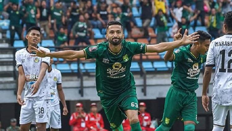 Meski saat ini bergabung bersama klub Tajikistan bernama FC Istiklol, Manuchekhr Dzhalilov belum bisa move on dari Persebaya Surabaya. - INDOSPORT