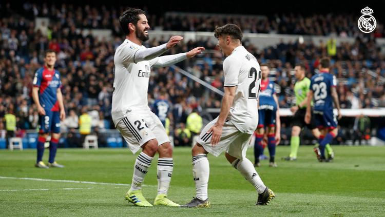 Isco merayakan golnya untuk Real Madrid ke gawang Huesca di pertandingan LaLiga Spanyol, Senin (01/04/19) dini hari WIB. Copyright: realmadrid.com