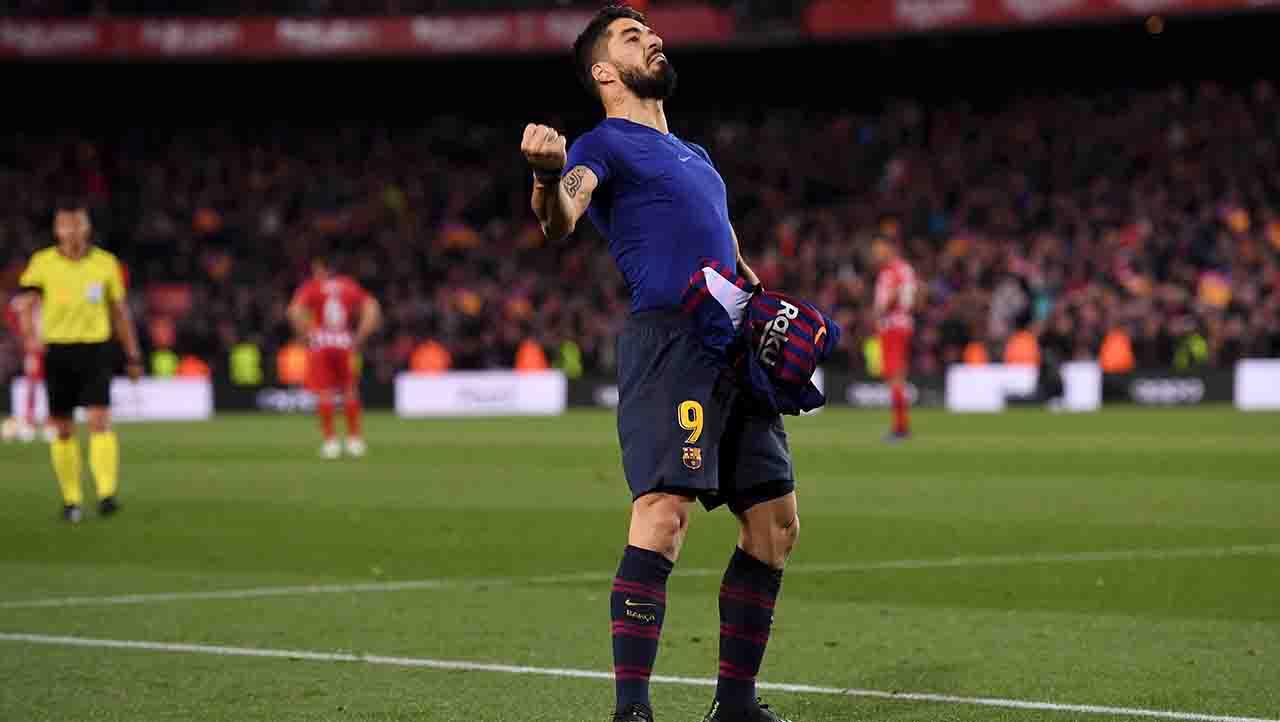 Aksi selebrasi Luis Suarez melakukan selebrasi usai cetak gol pada menit ke-85 Minggu (07/04/19). Alex Caparros / Getty Images