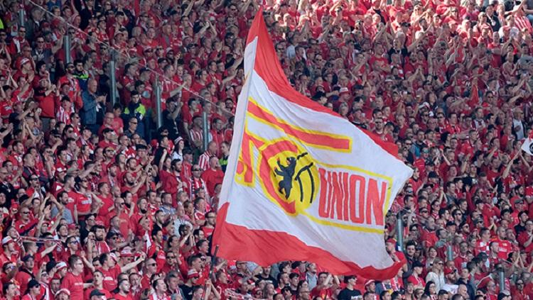 Mengupas kisah Union Berlin yang mampu menembus Eropa dari kasta ketiga jauh sebelum promosi ke kasta teratas Bundesliga Jerman.