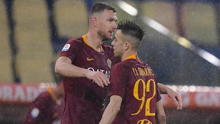 Perayaan gol Edin Dzeko dan El Shaarawy ke gawang Udinese, Minggu (14/04/19) dini hari WIB, di Stadio Olimpico